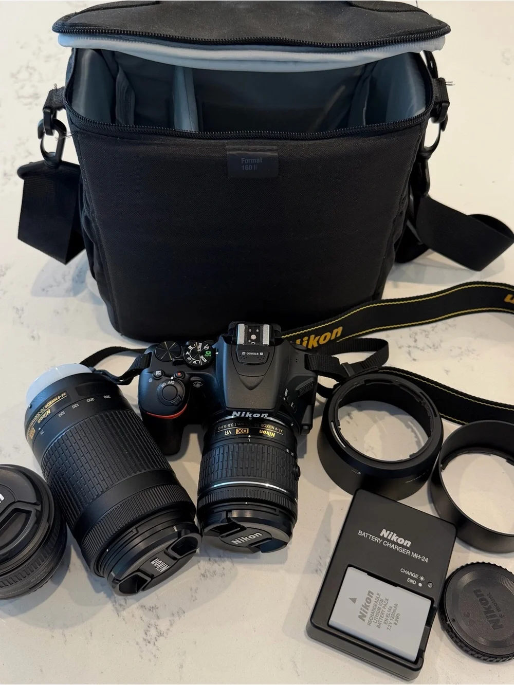 Nikon D5600 Black DSLR Camera Kit with 18-55mm, 70-300mm, and 50mm f/1.8G Lenses